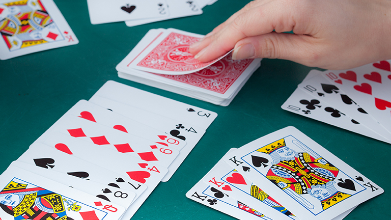 how to play the card game rummy